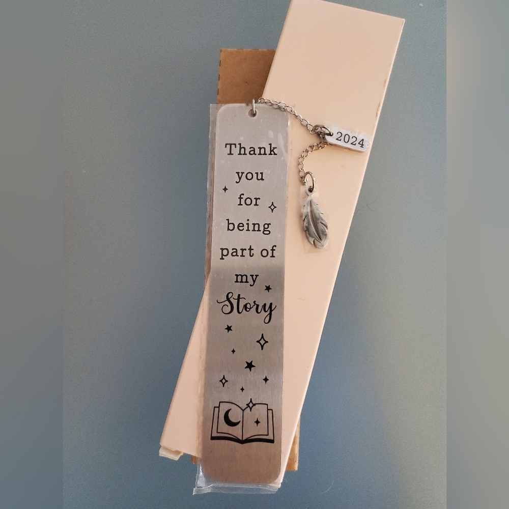 Silver adorned book mark